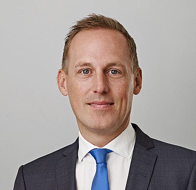 The portrait photo of Michael Weiß, transaction manager at Hamborner Reit AG